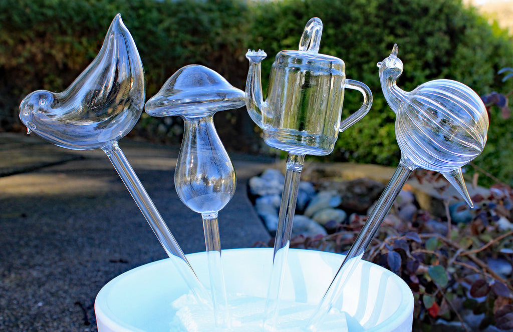 Set of 4 Small Hand Blown Clear Glass Self Watering Aqua Globes in Different Shapes of Mushroom, Bird, Snail and Watering Can