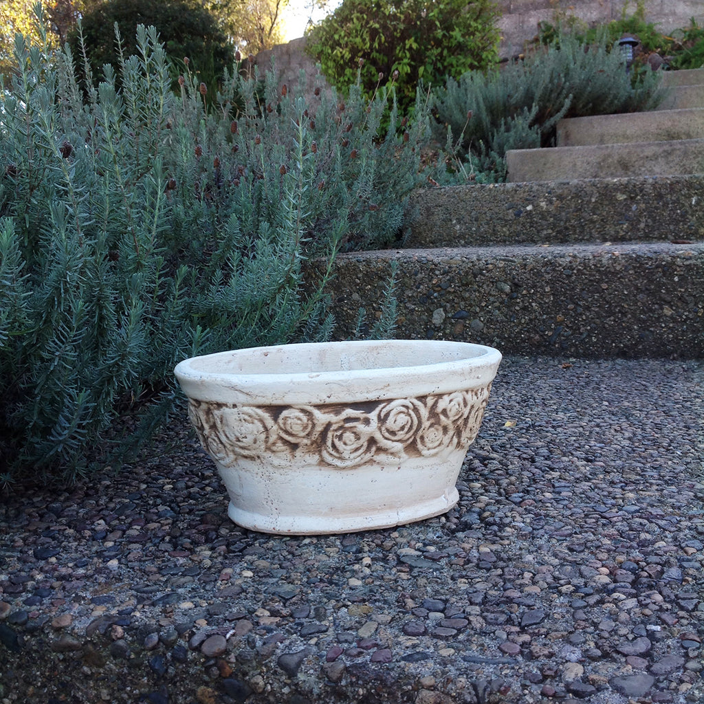 Old world hand-pressed ceramic vintage white flower pot with embellished roses
