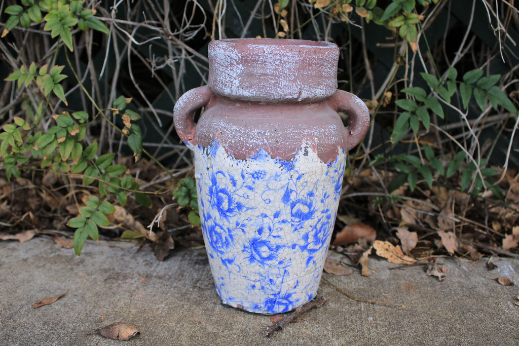 Vintage blue and white ceramic vase. Ancient Asian reproduction of a classic storage jug