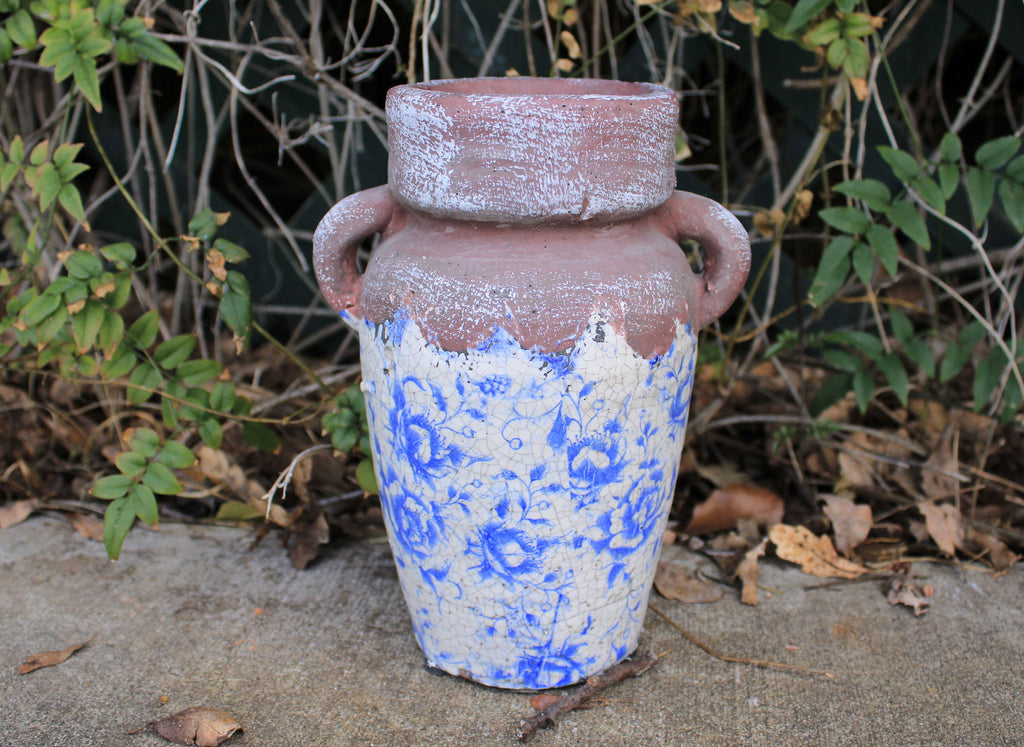 Vintage blue and white ceramic vase. Ancient Asian reproduction of a classic storage jug