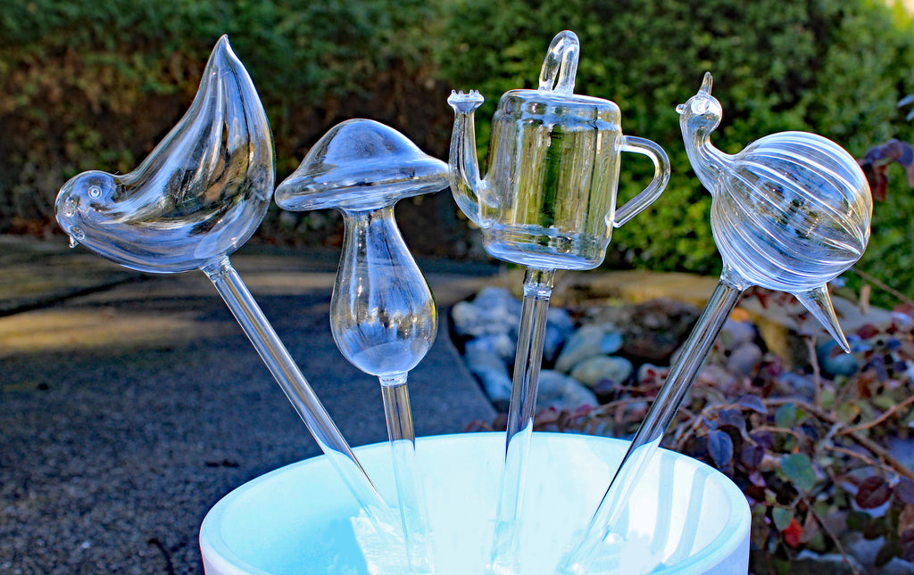 blumat glass plant self watering globes Set of 4 Small Hand Blown Clear Glass Self Watering Aqua Globes in Different Shapes of Mushroom, Bird, Snail and Watering Can