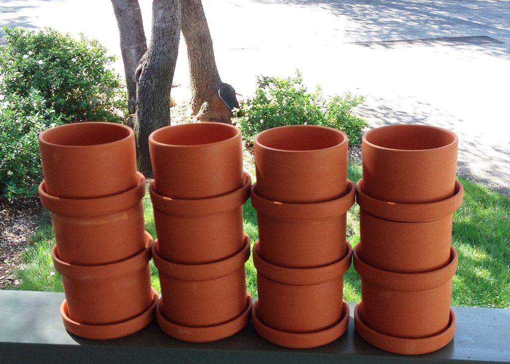 Bulk buy, Natural terracotta color fat walled classic round pots and trays.