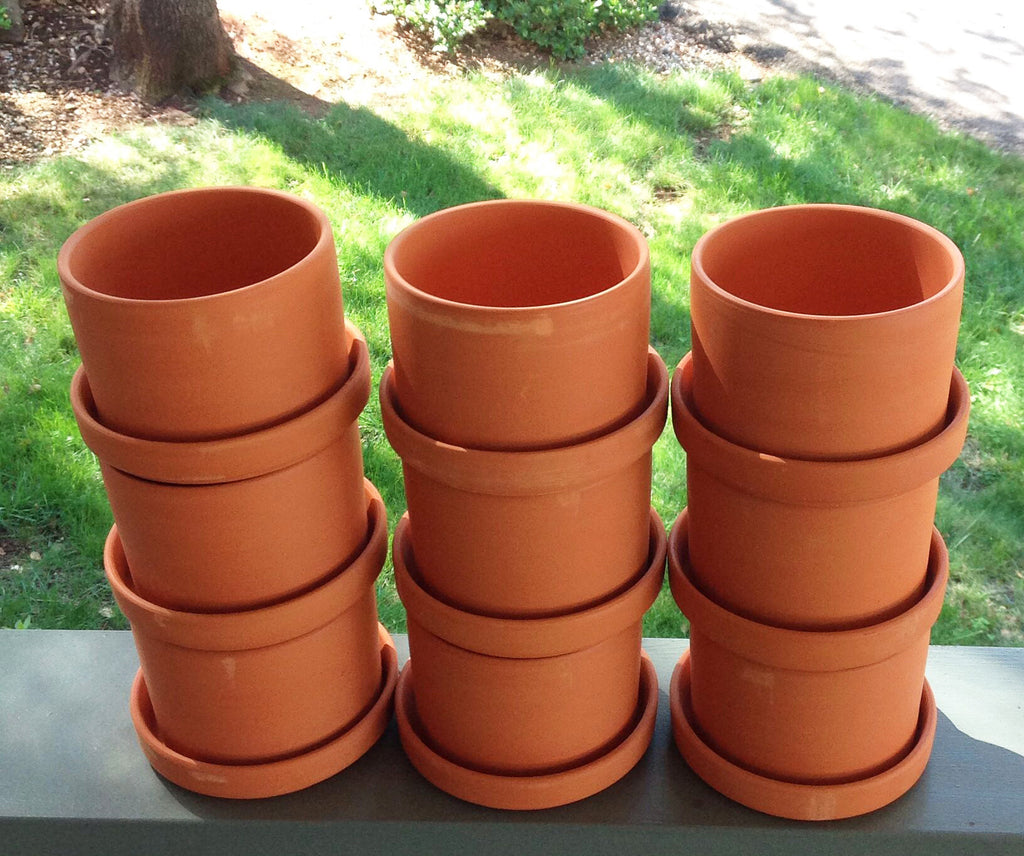 Bulk buy, Natural terracotta color fat walled classic round pots and trays.